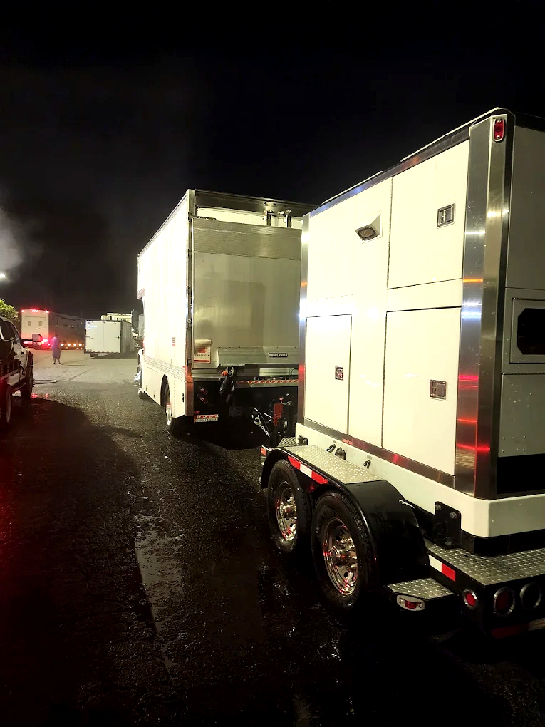 Fleet trucks on lot at night - Stone Mountain, GA